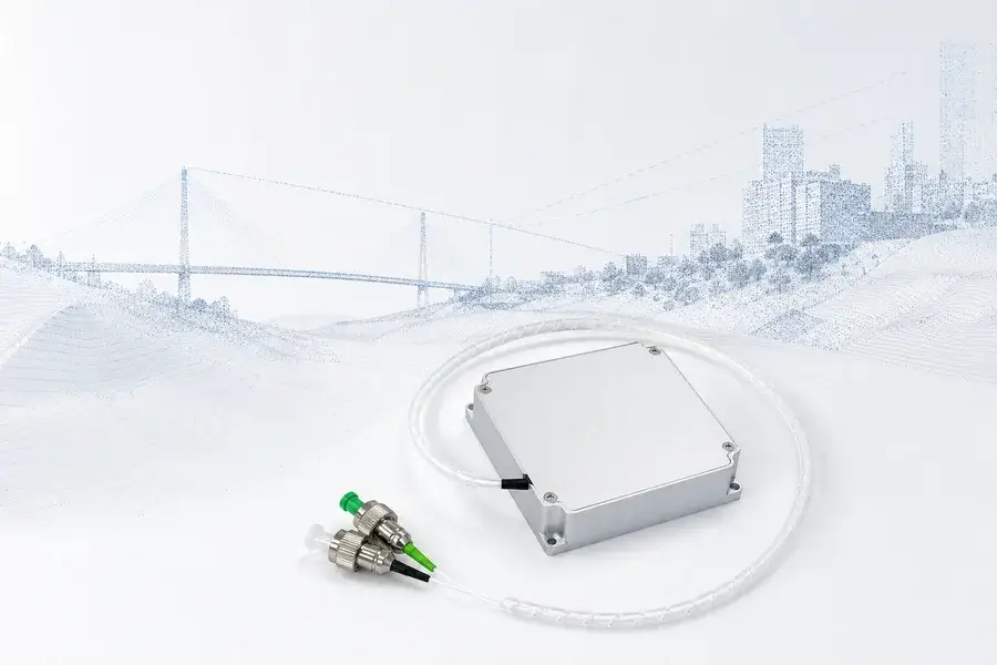 Compact Lumexis 1.5 µm pulsed laser source beside a georeferenced urban and terrain point cloud