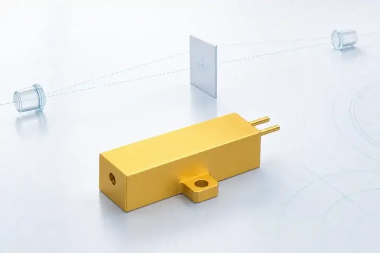 Compact erbium glass laser source on a clean optical engineering background.