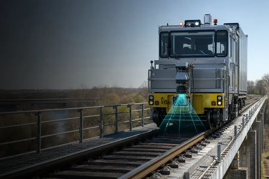 Rail inspection vehicle using conceptual laser scanning to measure track and corridor geometry